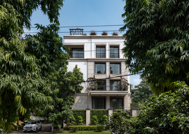 A modern home that nods to the neoclassical style and celebrates the essence of family life.